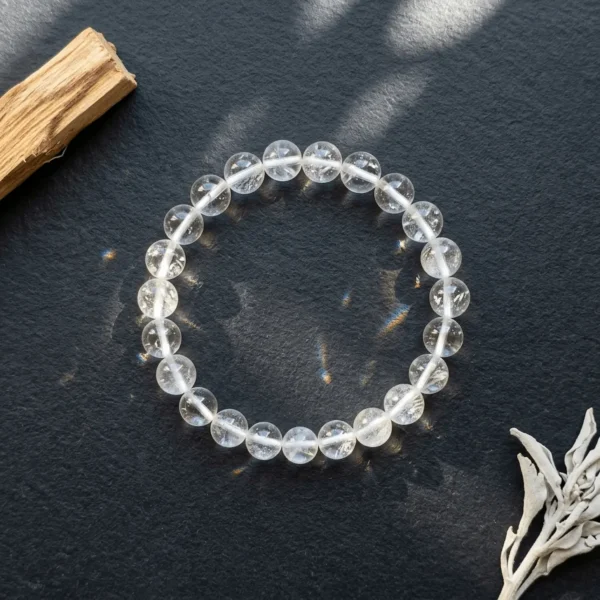Clear quartz crystal bracelet with natural rainbow light reflections