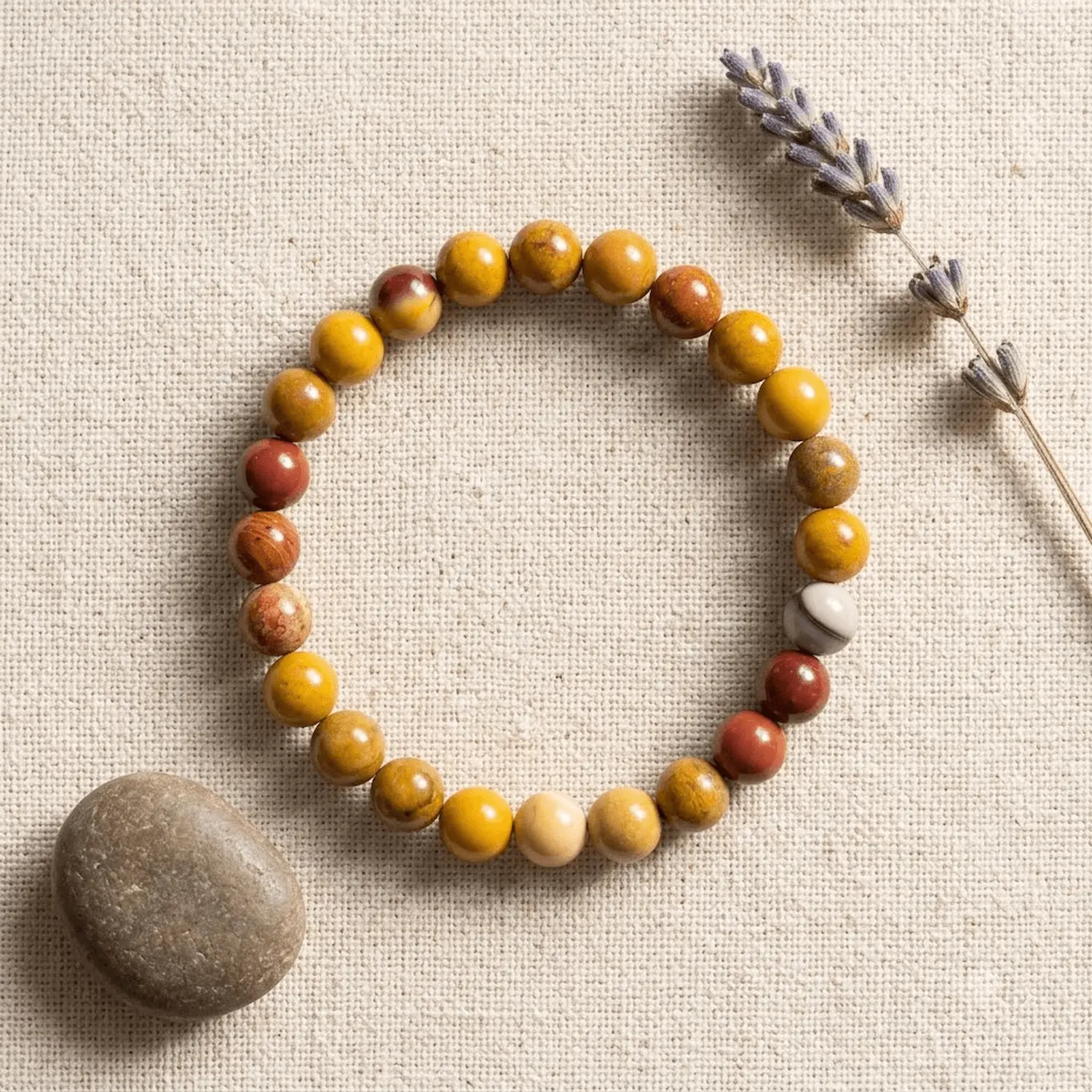 Mookaite Jasper 8mm crystal bracelet on natural fabric