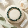 Moss Agate 8mm crystal bracelet styled with selenite and natural decor
