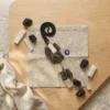 Selenite and Black Tourmaline crystal hanger styled with raw crystals and an evil eye charm