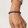 Lapis lazuli crystal bracelet 8mm worn on wrist showing bead size