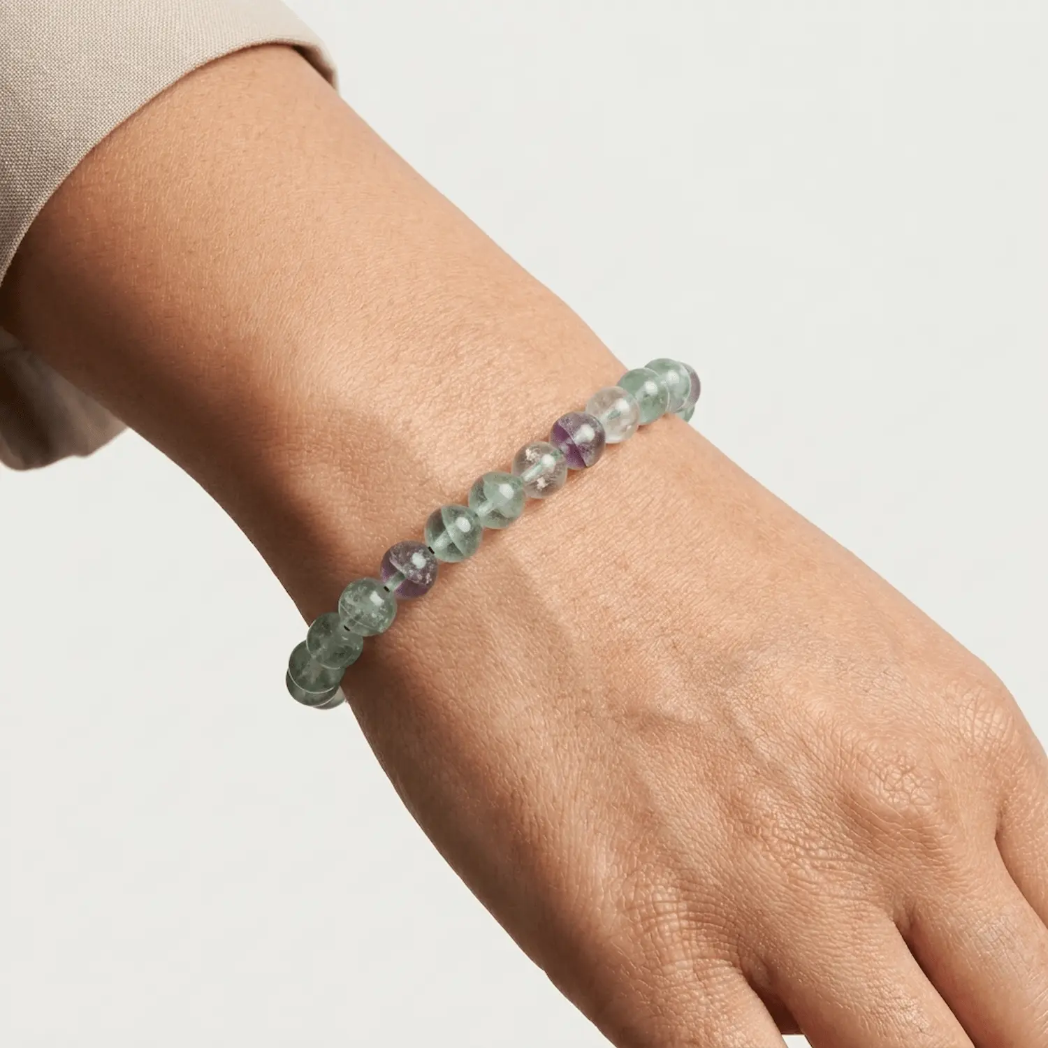 8mm Multicolored fluorite crystal bracelet worn on wrist showing size and fit