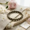 Pyrite crystal bracelet styled with soft fabric flowers and crystal decor