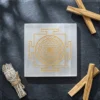 Selenite Charging Plate Shree Yantra with Palo Santo and sage